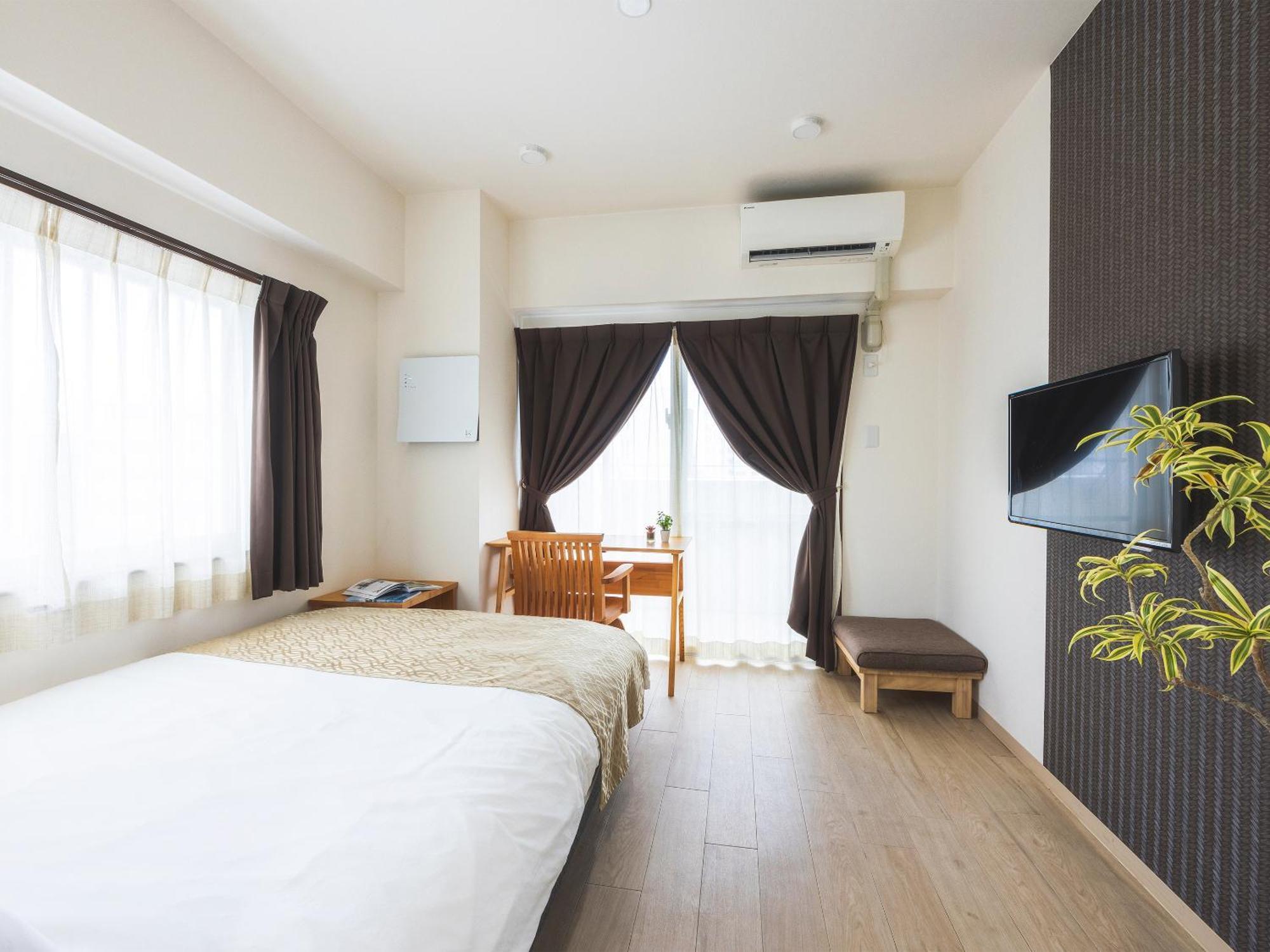 Comfort Plus Chatan Luaran gambar